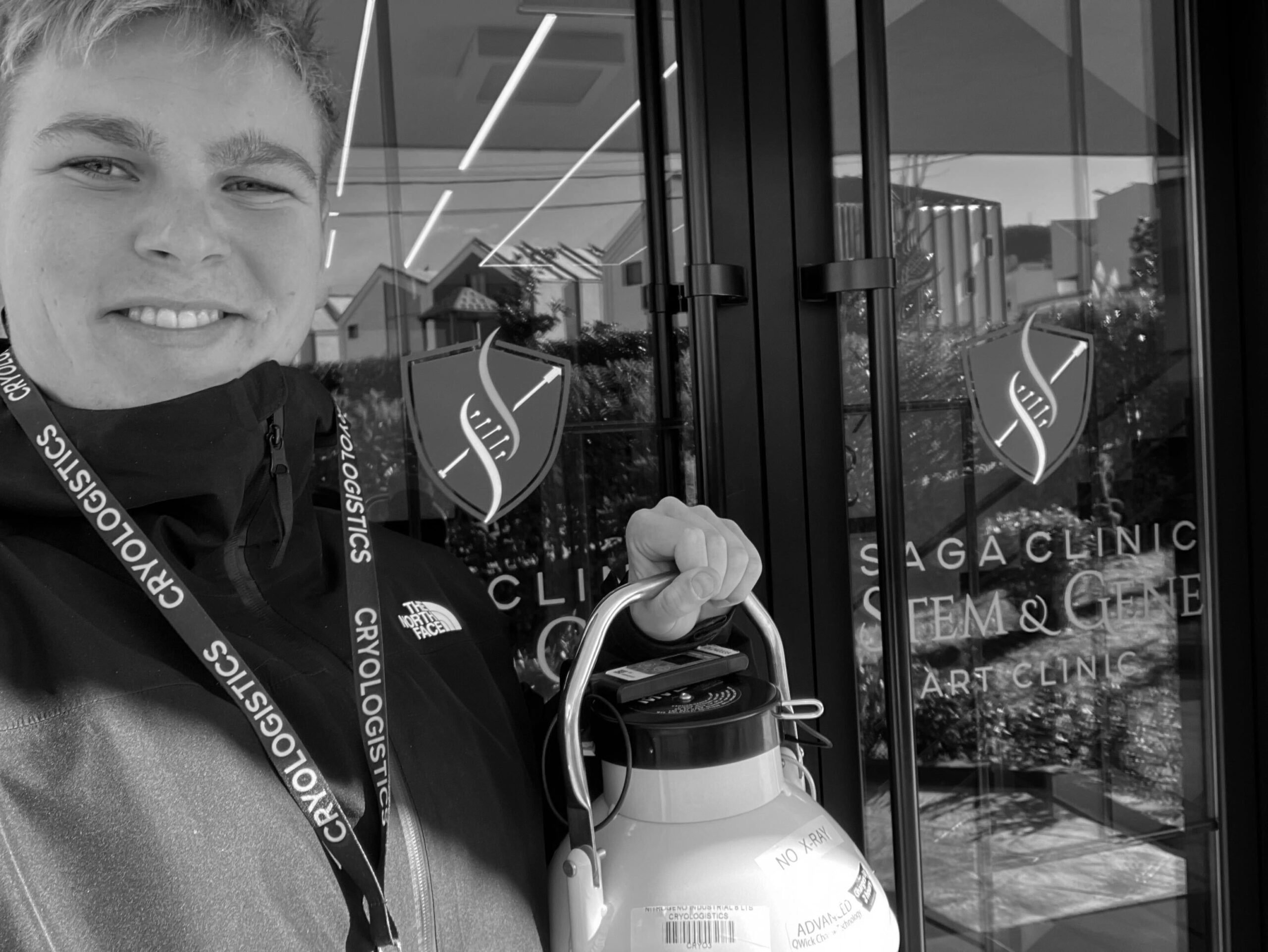 CryoLogistics courier hand-carrying a cryoshipper for transporting frozen embryos internationally