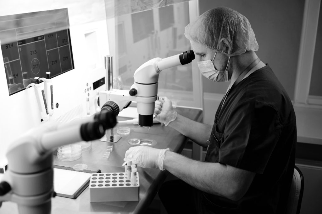 Embryologist performing preimplantation genetic testing for IVF