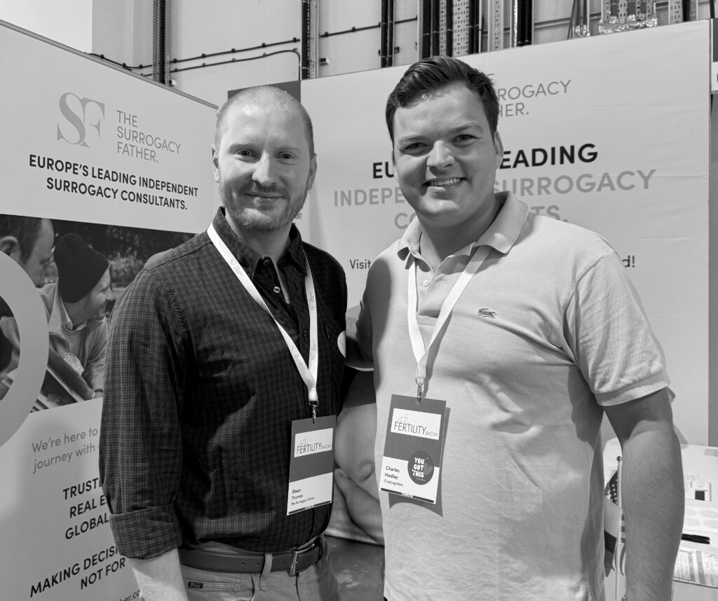 The Surrogacy Father and CryoLogistics courier smiling at a fertility conference